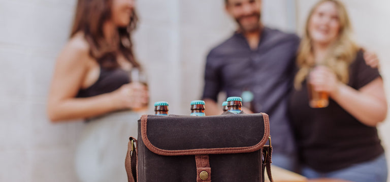 beer caddy with a group of friends chatting and drinking beers in the background