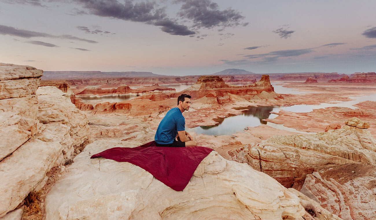 hiker taking a break on blanket