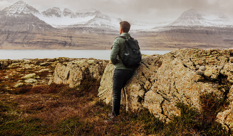 hiker with backpack observing the view