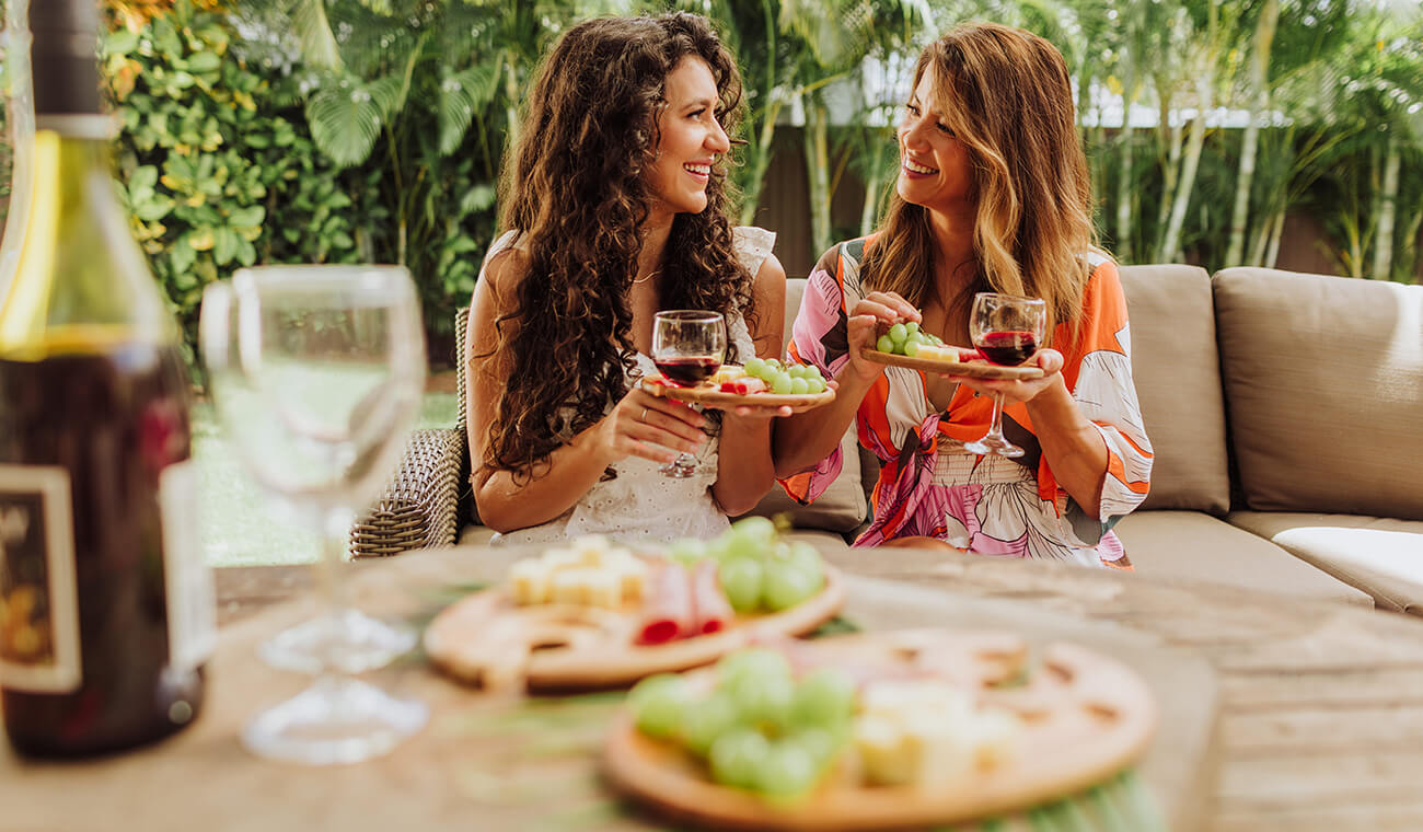 ladies drinking wine and laughing